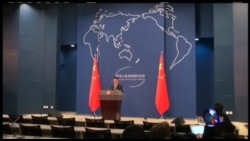 中国促对话解决争端 网民呼吁反美游行