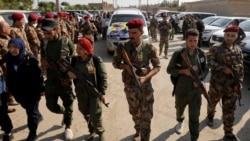 資料照片：敘利亞民主軍戰士在敘利亞東北的卡米甚利鎮為陣亡戰友舉行葬禮。 (2019年10月22日)