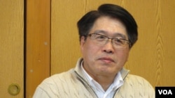 台灣民意基金會董事長游盈隆