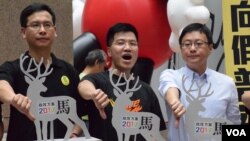 新盟主同盟立法會議員范國威(中)表示，人大8-31框架之下的政改方案，泛民不會袋住先。 (美國之音記者湯惠芸 拍攝)