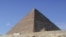 Tourists visiting one of the three main pyramids at the Giza necropolis outside Cairo, Egypt. (photo: Diaa Bekheet)
