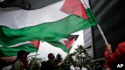 People rally in support of the Palestinian people amid the latest Israel-Hamas war outside Israel's embassy in Bogota, Colombia, Oct. 24, 2023.