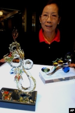 仟庚玻璃負責人周彩怡。