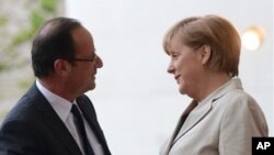 德國總理默克爾和法國新總統奧朗德星期二在柏林第一次會晤