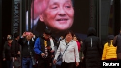 2018年11月14日，北京中國國家博物館舉辦的中國改革開放40週年展覽中，人們參觀關於中國前領導人鄧小平的內容。