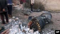 照片顯示被擊落的俄羅斯戰機殘骸