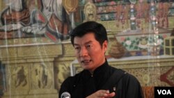 A girl poses for a photo during a visit to the Instagram museum &quot;Smile Safari&quot; that recently opened in Brussels, Belgium.