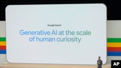FILE - A man stands before an audience at the annual developer conference known as Google I/O in Mountain View, Calif., May 14, 2024.