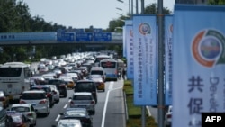 资料照：北京一街道为中非合作论坛的召开插满旗帜。（2018年9月3日）