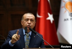 土耳其总统埃尔多安10月23日对土耳其议会发表讲话。