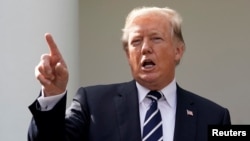 美國川普總統10月16日在白宮玫瑰園新聞發佈會上。