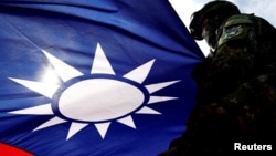 FILE PHOTO: Taiwan activates air defence as China aircraft enter zone