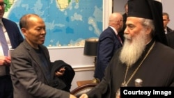 李柏光今年2月7號在美議員辦公室會見來自耶路撒冷的東正教大主教