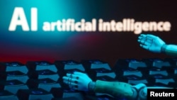 ຮູບ​ພາບ​ສະ​ແດງ​ໃຫ້​ເຫັນ​ຂໍ້​ຄວາມ​ທີ່​ອ່ານ "AI artificial intelligence​, keyboard ແລະ​ມື​ຫຸ່ນ​ຍົນ​