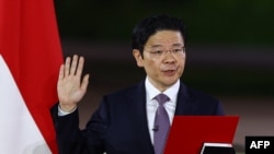 新加坡新總理黃循財在新加坡國家會議中心舉行的儀式上宣誓就職。 （2024年5月15日）