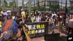 香港上水和沙田區2019年7月13日就曾經爆發反“水客”抗議。圖片來源：美聯社