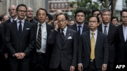 香港大律師公會成員和法律界人士遊行前往中聯辦反對港府計劃批准送中法案。 （2019年6月6日）