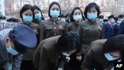 北韓官方稱幾十萬人自願參軍或重新入伍以對抗首爾和華盛頓。（北韓官方報刊2023年3月18日照片）