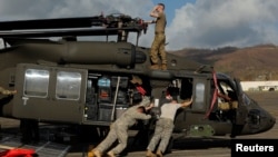 2017年10月4日波多黎各瑪麗亞颶風之後美國陸軍第一裝甲師士兵進行恢復工作。