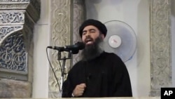 伊斯蘭國頭目阿布·貝克爾·巴格達迪(Abu Bakr al-Baghdadi) - 美聯社資料照片