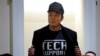 Elon Musk shows off his t-shirt reading "Tech Support" while speaking at the first cabinet meeting hosted by U.S. President Donald Trump, at the White House in Washington, Feb. 26, 2025. 