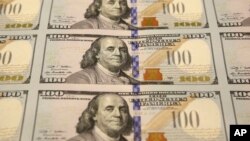 Новая $100-я купюра 