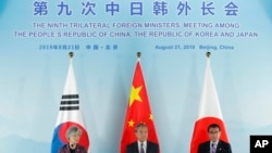 中日韓三國外長聯合記者會。（2019年8月21日）