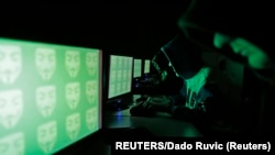 有關網絡黑客行動的圖片說明。