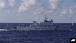 日本海上保安厅公布的照片显示中国海监-51号2012年9月14日晨在离争议岛屿大约24公里的水域巡弋。