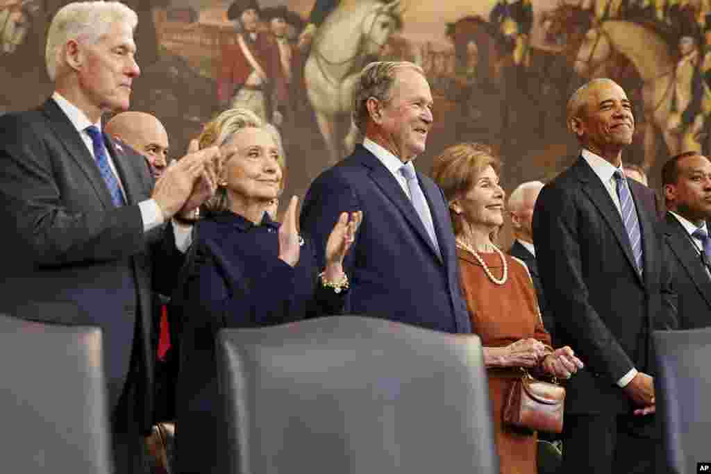 From left: Former President Bill Clinton, former Secretary of State Hillary Clinton, former President George W. Bush, former first lady Laura Bush and former President Barack Obama, attend the 60th Presidential Inauguration in the Rotunda of the U.S. Capitol in Washington, Jan. 20, 2025.