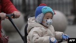 北京大街上的一名兒童。 （法新社2024年1月17日）