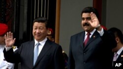 委內瑞拉總統馬杜羅2014年7月20日在卡拉卡斯歡迎到訪的中國國家主席習近平。