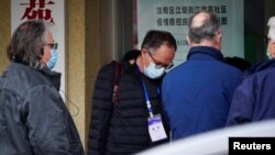 世衛組織新冠病毒源頭調查組成員視察武漢漢陽區江欣苑社區。 （2021年2月3日）