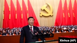中共領導人習近平在北京人大會堂召開的中共二十大開幕式上講話。 （2022年10月16日）