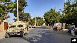 阿富汗政府軍的悍馬軍車在喀布爾以北的昆都士市巡邏（2021年6月21日）