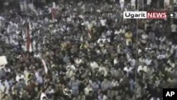 叙利亚民众在拉斯坦城举行抗议示威 要求阿萨德总统下台