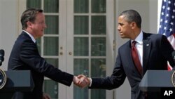 美國總統奧巴馬 (右) 和英國首相卡梅倫(左)