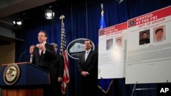 美國司法部副部長羅森斯坦星期四在新聞發佈會上。