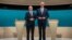 Social Democratic Party Chancellor Olaf Scholz and his conservative rival of the Christian Democratic Union Friedrich Merz are pictured in a studio of the ARD and ZDF television broadcasters ahead of their first TV debate in Berlin, Germany, Feb. 9, 2025.