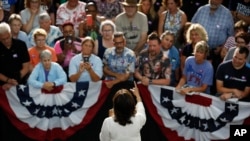 Democratic presidential candidate Sen. Kamala Harris, D-Calif., speaks at a rally, Aug. 12, 2019, in Davenport, Iowa.
