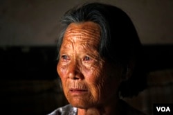 陈光诚的母亲王金祥。