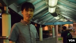 參選區議會的「慈雲山建設力量」成員譚俊文 (美國之音湯惠芸拍攝)