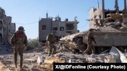 以色列国防军2025年9月17日提供的照片显示，在加沙城开展地面攻势的第二天，以军地面部队正在清除恐怖分子及其军事设施。