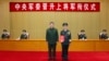 中國領導人習近平在北京主持授予陳輝上將軍銜的儀式。 （2024年12月23日）
