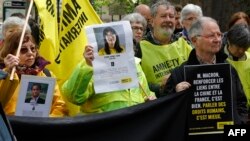 國際特赦組織的人權運動人士2024年5月4日在中國國家主席習近平訪問法國之際舉行示威。 （法新社）