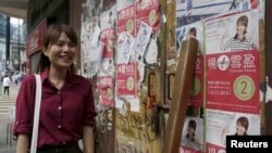 资料照：获得保释的其中一名被告，香港湾仔取区议会主席杨雪盈 （2015年11月23日）