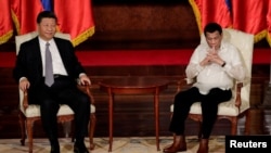 中國國家主席習近平與菲律賓總統杜特爾特2018年11月20日在菲律賓馬尼拉舉行會晤。 （路透社）