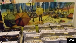 有種文化在香港書展推出攝影集及速寫繪本，以照片及畫作紀錄歷時79日的香港雨傘運動各種場面。(美國之音湯惠芸)