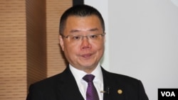 中国全国人大代表，暨南大学兼职教授洪为民 （美国之音记者 申华拍摄）