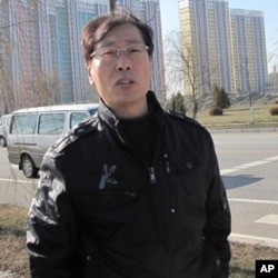 丹东市外办副主任焦石